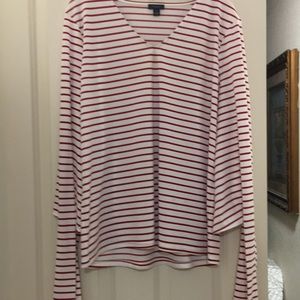 This is a very nice  red and white women blouse with long sleeves